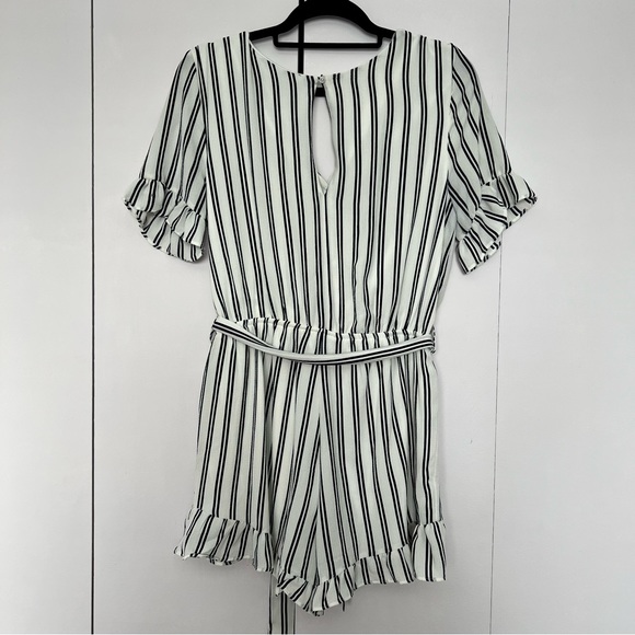 White and black striped shorts romper with ruffle detail - Picture 3 of 12